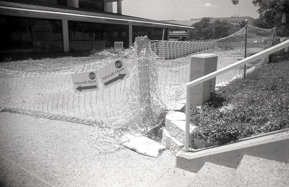 picture of orange fence through red filter